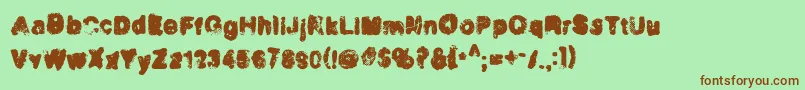 Incinera Font – Brown Fonts on Green Background