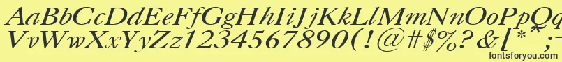 UkCaslonItalic-Schriftart – Schwarze Schriften auf gelbem Hintergrund