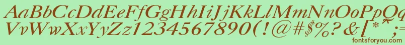 Fonte UkCaslonItalic – fontes marrons em um fundo verde