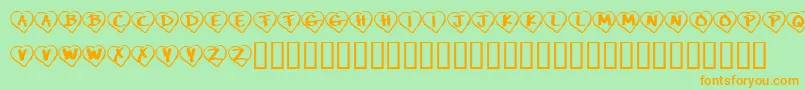 フォントKrPaperHearts – オレンジの文字が緑の背景にあります。