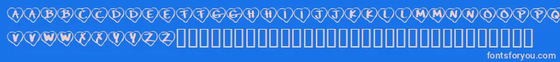 Czcionka KrPaperHearts – różowe czcionki na niebieskim tle