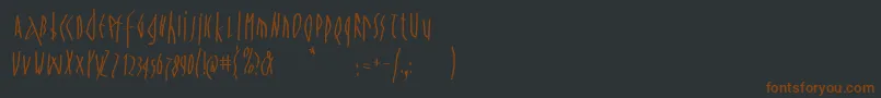 Spontanocondenso Font – Brown Fonts on Black Background