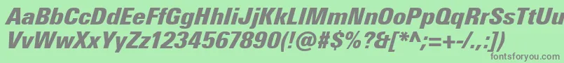 フォントUniversNextProExtrablackCondensedItalic – 緑の背景に灰色の文字