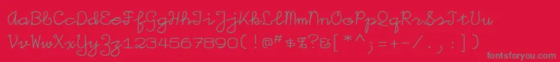 Iggolitemono-fontti – harmaat kirjasimet punaisella taustalla