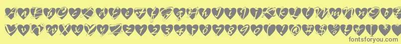 Saiba mais sobre a fonte Allheart Fonte Allheart – fontes cinzas em um fundo amarelo
