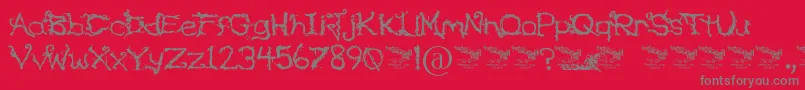 Czcionka UponTheOvergrowth – szare czcionki na czerwonym tle