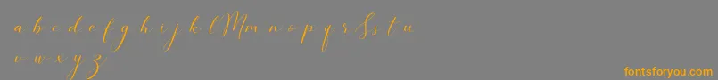フォントSimpleMonologueDemo – オレンジの文字は灰色の背景にあります。