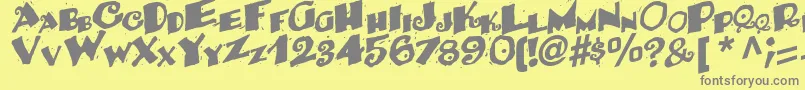 フォントBackRegularTtstd – 黄色の背景に灰色の文字