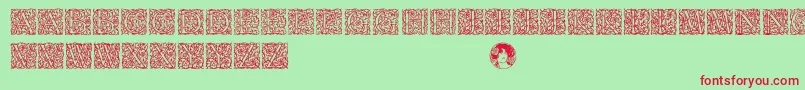 Arabesqueinitialen Font – Red Fonts on Green Background