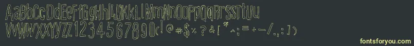 Fonte CartoonEastOutline – fontes amarelas em um fundo preto