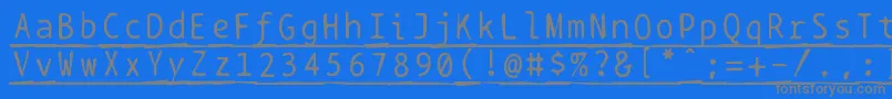 Fonte Bptypewritedamagedunderscored – fontes cinzas em um fundo azul