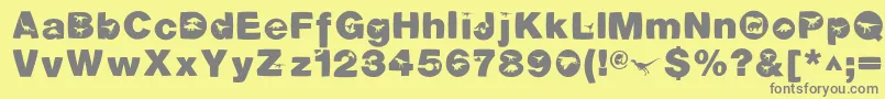 DinotiquaHeavy Font – Gray Fonts on Yellow Background