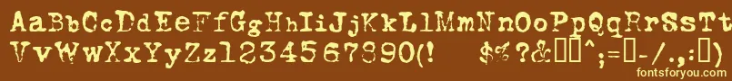 FoxscriptNormal-fontti – keltaiset fontit ruskealla taustalla
