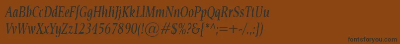 フォントEsperantoCondItalic – 黒い文字が茶色の背景にあります