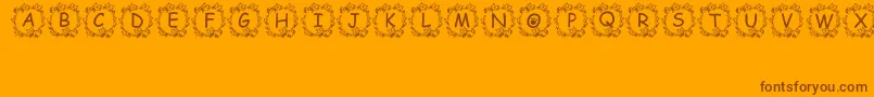 Jennas Font – Brown Fonts on Orange Background