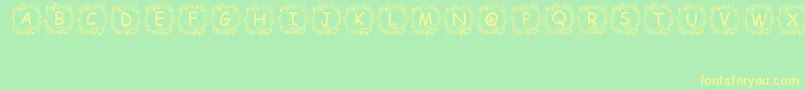 フォントJennas – 黄色の文字が緑の背景にあります