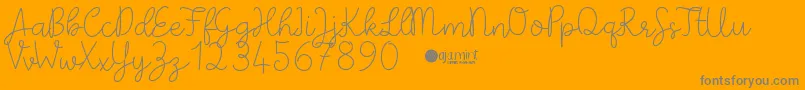 PaperbowDemo-fontti – harmaat kirjasimet oranssilla taustalla