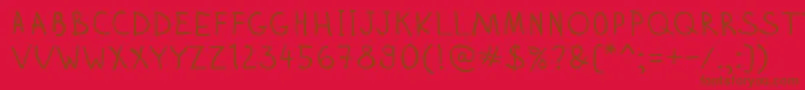 フォントZhizn – 赤い背景に茶色の文字