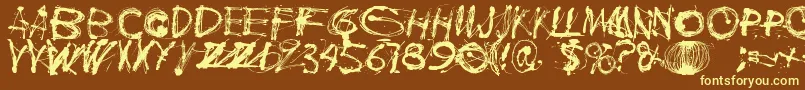 Polla-fontti – keltaiset fontit ruskealla taustalla