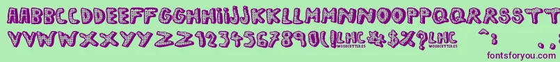 LeftHandComic Font – Purple Fonts on Green Background