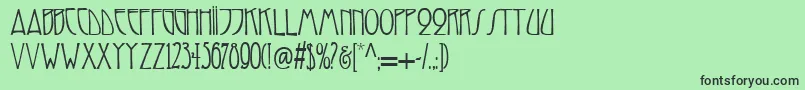 フォントReynold – 緑の背景に黒い文字