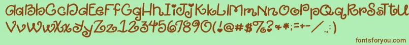 2peasGiggle Font – Brown Fonts on Green Background