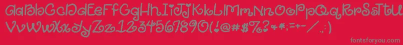 2peasGiggle Font – Gray Fonts on Red Background