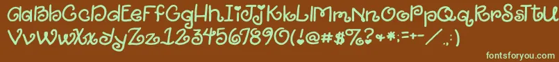 2peasGiggle Font – Green Fonts on Brown Background