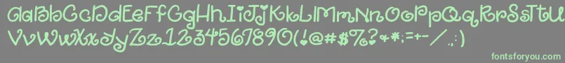 2peasGiggle Font – Green Fonts on Gray Background