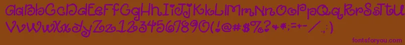 2peasGiggle Font – Purple Fonts on Brown Background