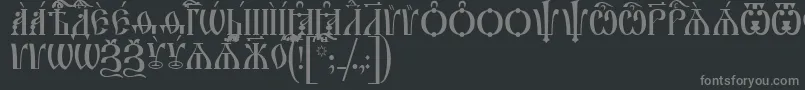 IrmologionCapsUcs-Schriftart – Graue Schriften auf schwarzem Hintergrund