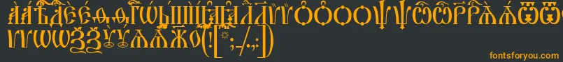フォントIrmologionCapsUcs – 黒い背景にオレンジの文字