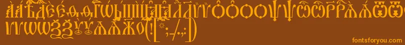 IrmologionCapsUcs-fontti – oranssit fontit ruskealla taustalla