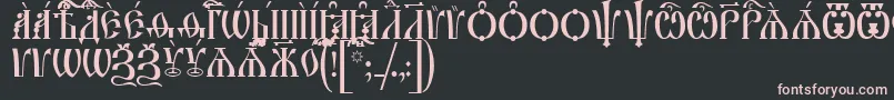 フォントIrmologionCapsUcs – 黒い背景にピンクのフォント