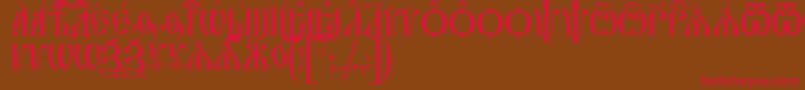 フォントIrmologionCapsUcs – 赤い文字が茶色の背景にあります。