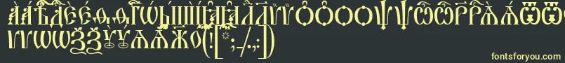 フォントIrmologionCapsUcs – 黒い背景に黄色の文字