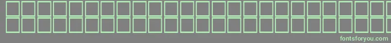 フォントAlSayf – 灰色の背景に緑のフォント