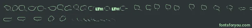 Czcionka Freakycommentballoonslt – zielone czcionki na czarnym tle