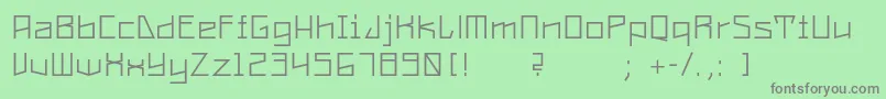 フォントConstructaUltrathin – 緑の背景に灰色の文字