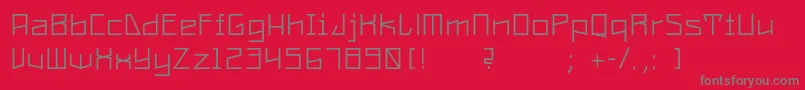 フォントConstructaUltrathin – 赤い背景に灰色の文字