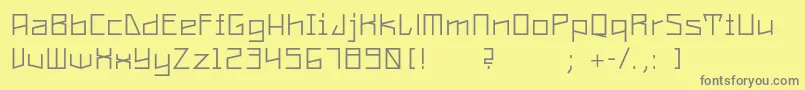 フォントConstructaUltrathin – 黄色の背景に灰色の文字