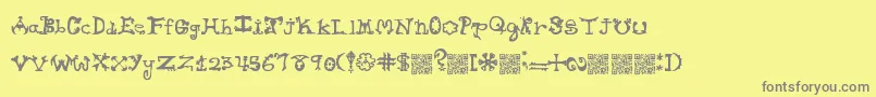 Hieroglyphlicks Font – Gray Fonts on Yellow Background