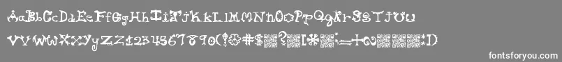 フォントHieroglyphlicks – 灰色の背景に白い文字