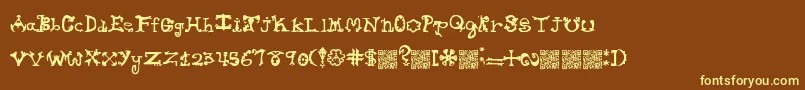 Hieroglyphlicks Font – Yellow Fonts on Brown Background