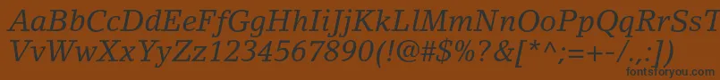 LinoletterstdItalic Font – Black Fonts on Brown Background