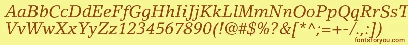 LinoletterstdItalic-Schriftart – Braune Schriften auf gelbem Hintergrund