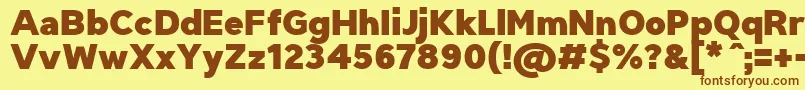 フォントTriompheBlack – 茶色の文字が黄色の背景にあります。