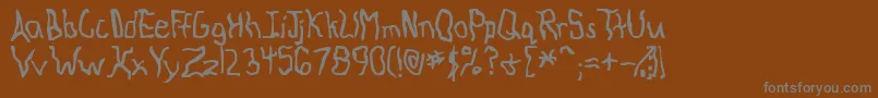 KnockedAround Font – Gray Fonts on Brown Background
