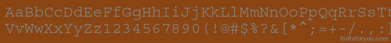 Courierstd-Schriftart – Graue Schriften auf braunem Hintergrund