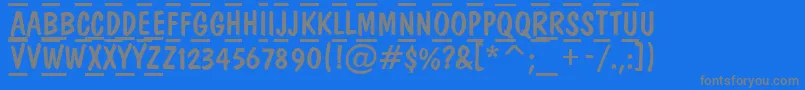 ADominotituldcfrcmb-fontti – harmaat kirjasimet sinisellä taustalla